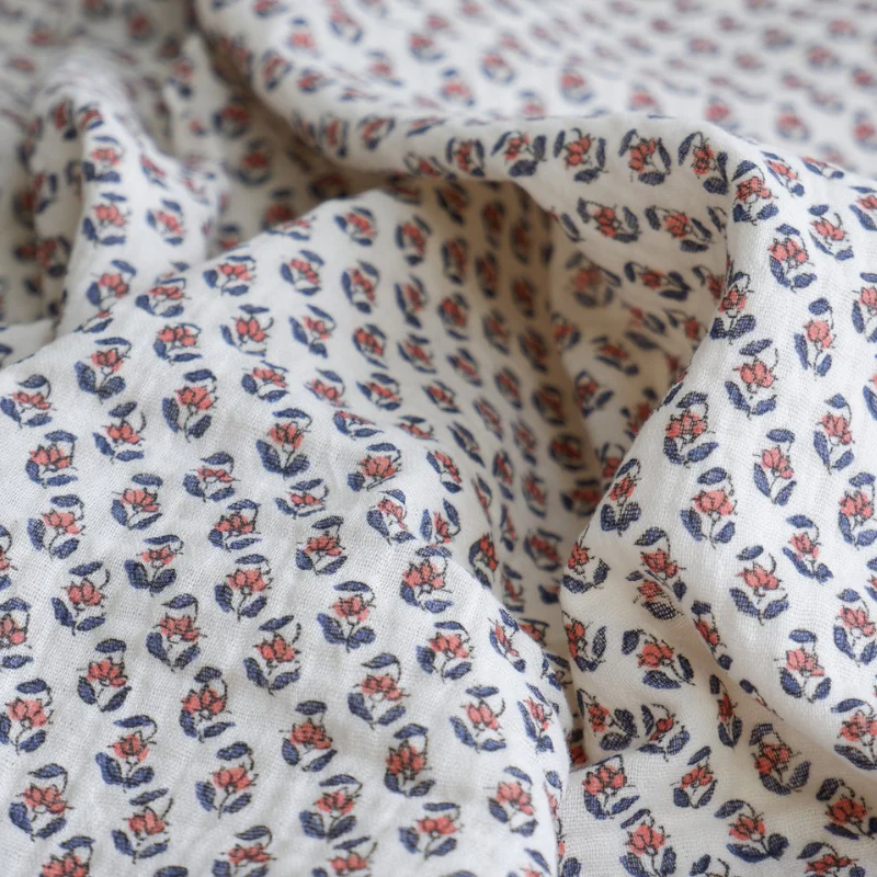 Tapis à langer nomade - Écrue à fleur tomette – Image 8